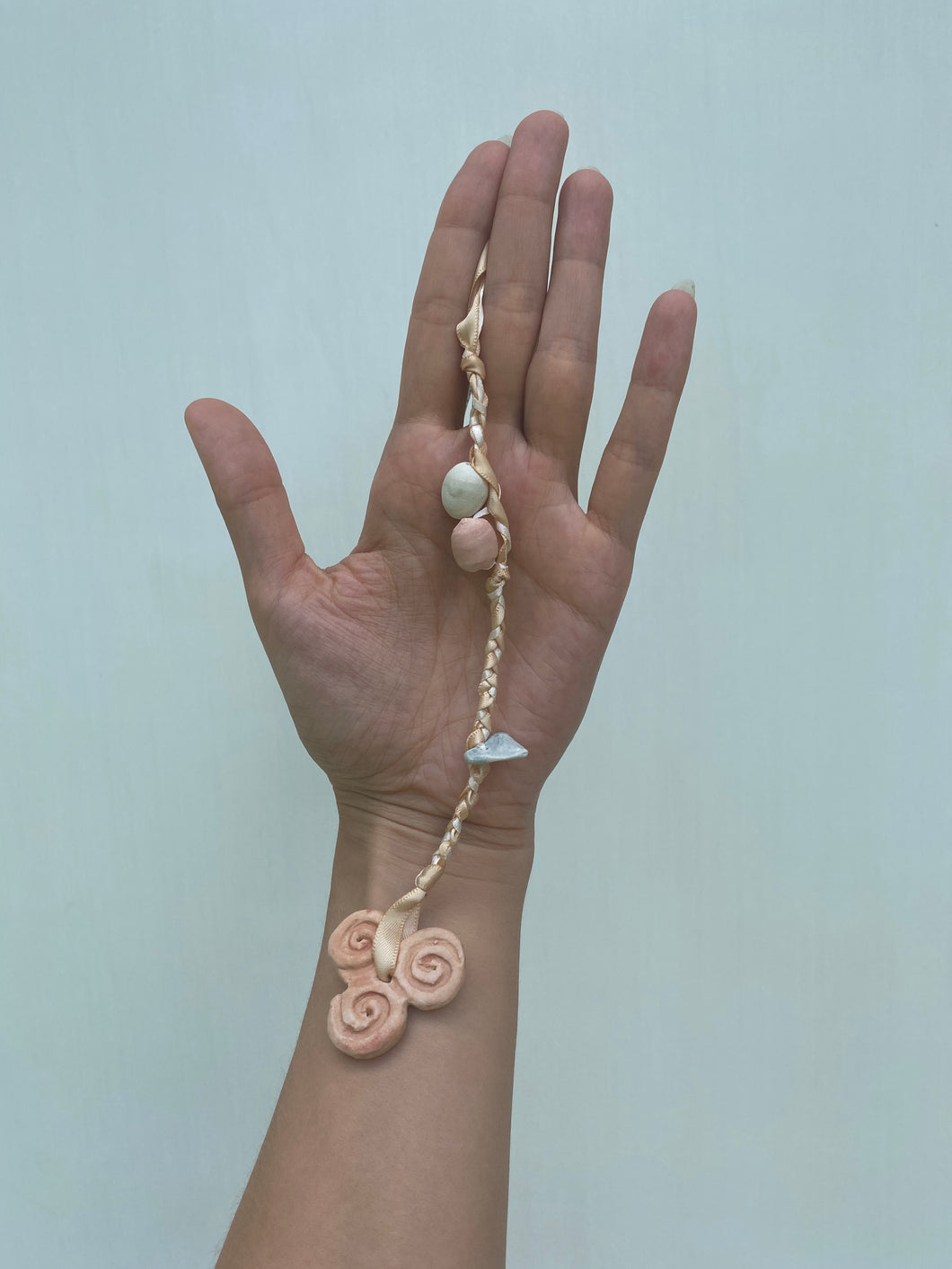 Triple Spiral Charm (Light Terra Cotta)